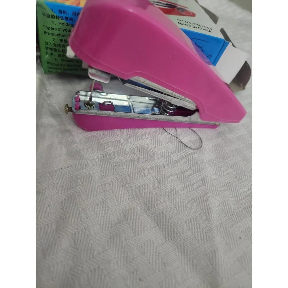 Mini Handheld Sewing Machine Pink Portable Manual Stitch Tool OM1818 New